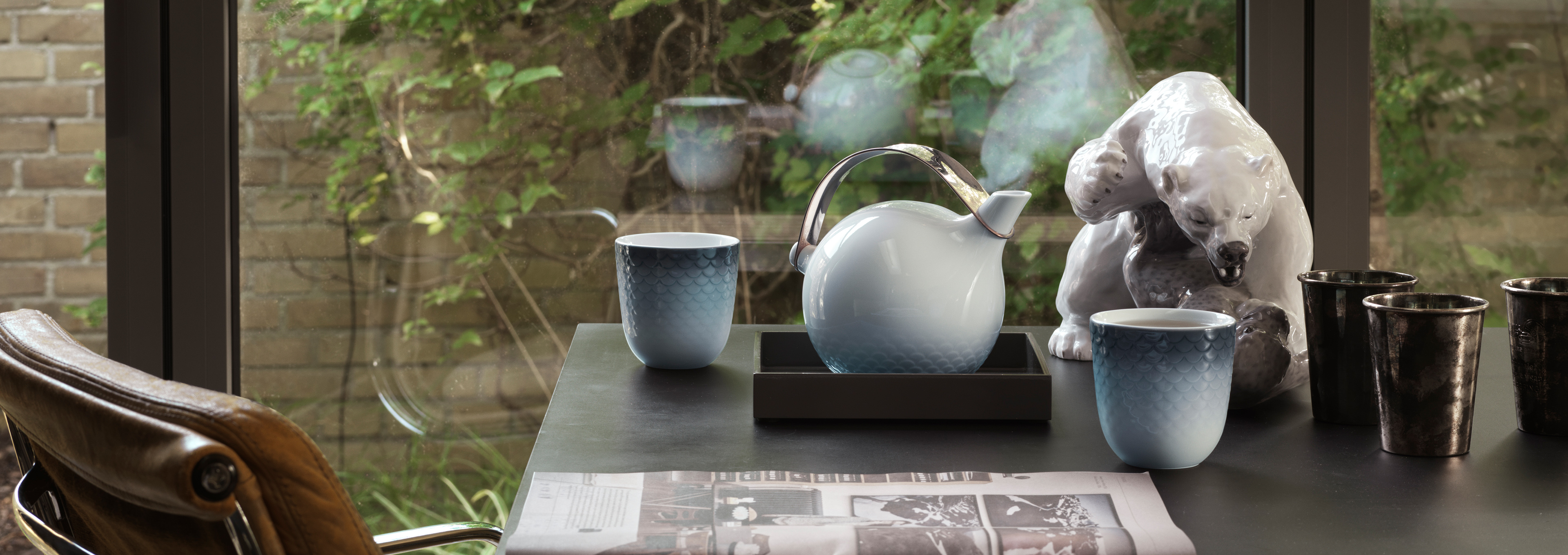 HAV Teapot and two Thermal mugs on a desk